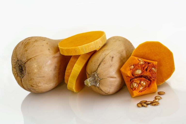 Vibrant orange sweet potatoes with slices and chunks, highlighting healthy, nutrient-dense superfood options.