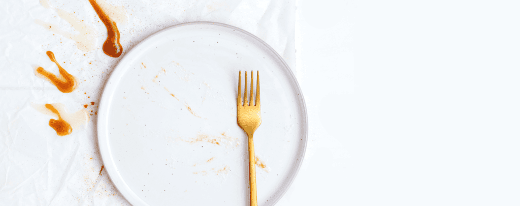 Healthy food plate with a fork, clean and nutritious meal, promoting wellness and balanced diet.
