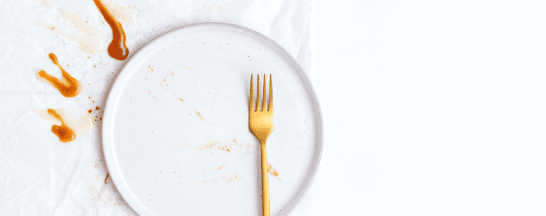 Healthy food plate with a fork, clean and nutritious meal, promoting wellness and balanced diet.
