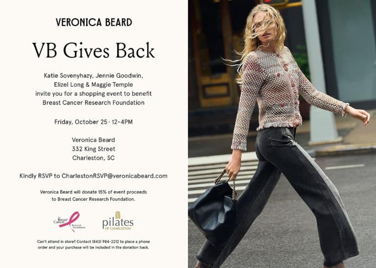 Woman walking on street with stylish black pants and textured jacket in Charleston SC for breast cancer fundraiser.
