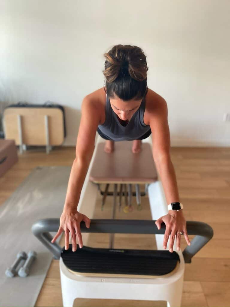 Pilates reformer workout in Charleston for core strength and flexibility.