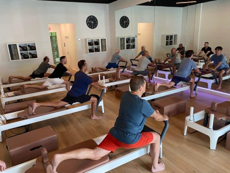 Pilates class in Charleston focusing on strength, flexibility, and core stability. Comfortable studio environment with expert instructors.